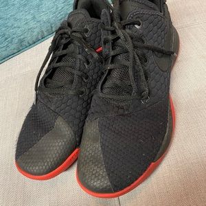 Black Nike sneakers / red bottom / men’s size 10.5